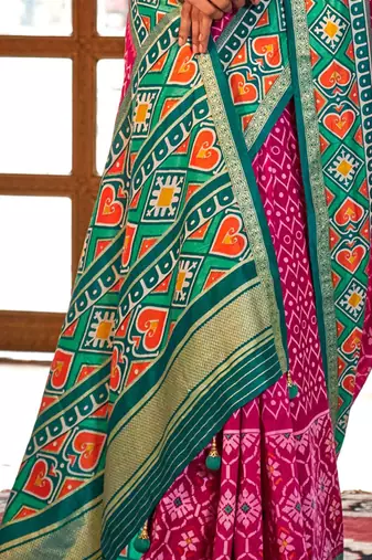 Pink ethnic motifs zari patola saree