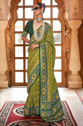 Green ethnic motifs zari patola saree