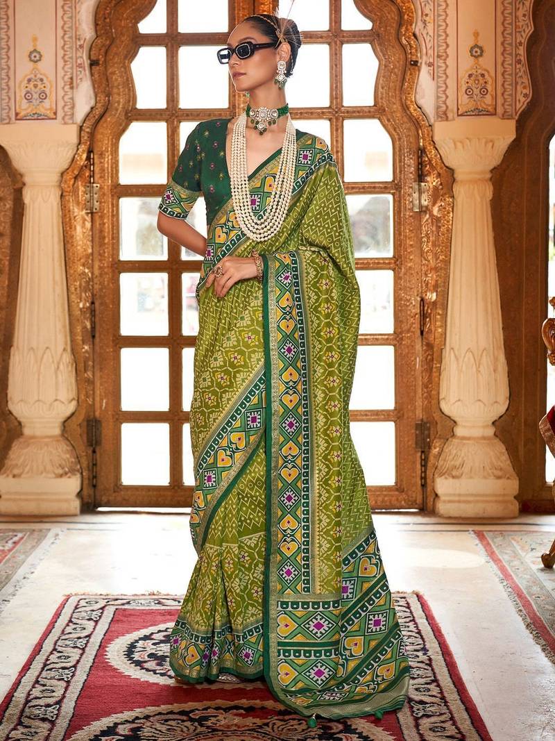 Green ethnic motifs zari patola saree