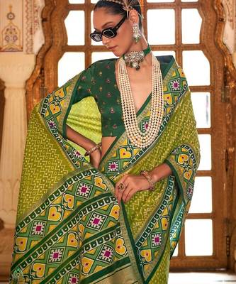 Green ethnic motifs zari patola saree 2
