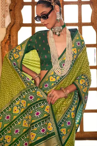 Green ethnic motifs zari patola saree