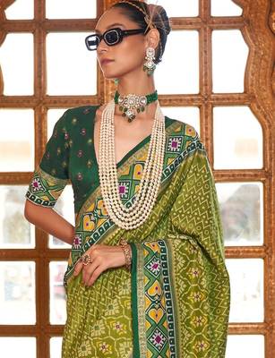 Green ethnic motifs zari patola saree 3