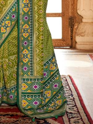 Green ethnic motifs zari patola saree 5