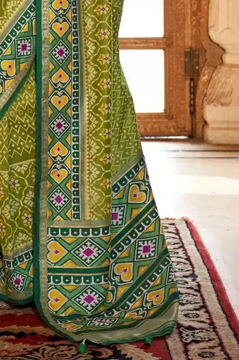 Green ethnic motifs zari patola saree
