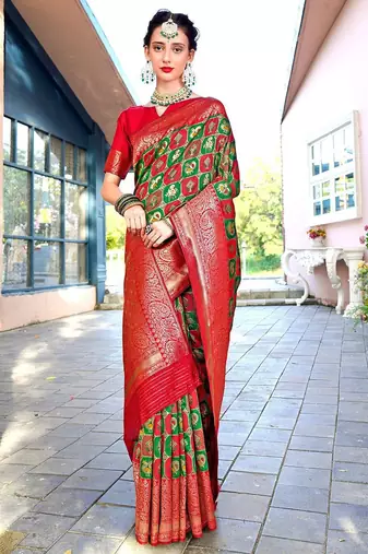 green ethnic motifs woven design zari detailed kanjeevaram saree