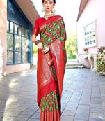 green ethnic motifs woven design zari detailed kanjeevaram saree