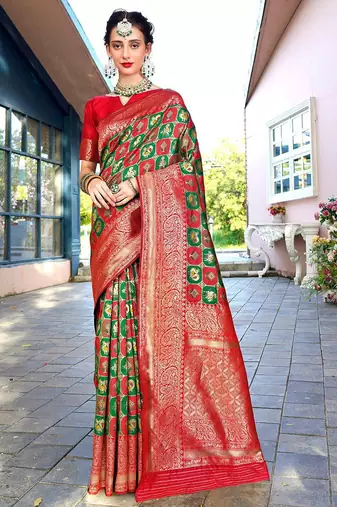 green ethnic motifs woven design zari detailed kanjeevaram saree