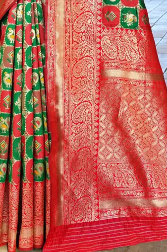 green ethnic motifs woven design zari detailed kanjeevaram saree