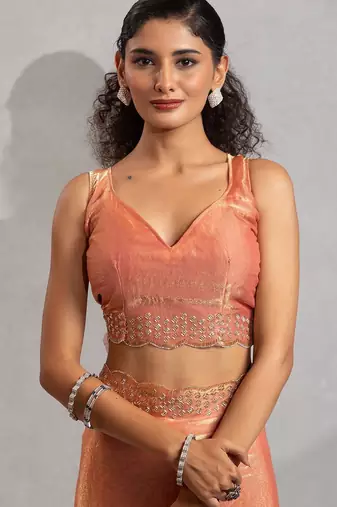 peach embellished beads and stones satin saree