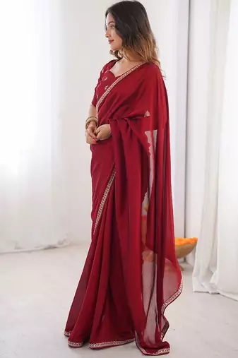 Maroon embroidered silk blend saree