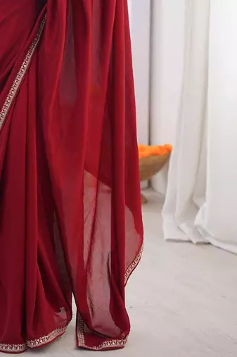 Maroon embroidered silk blend saree