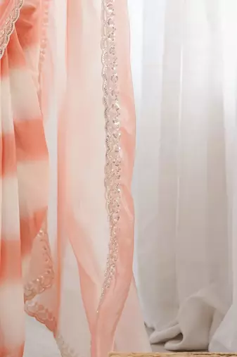 peach tie and dye beads and stones satin designer saree