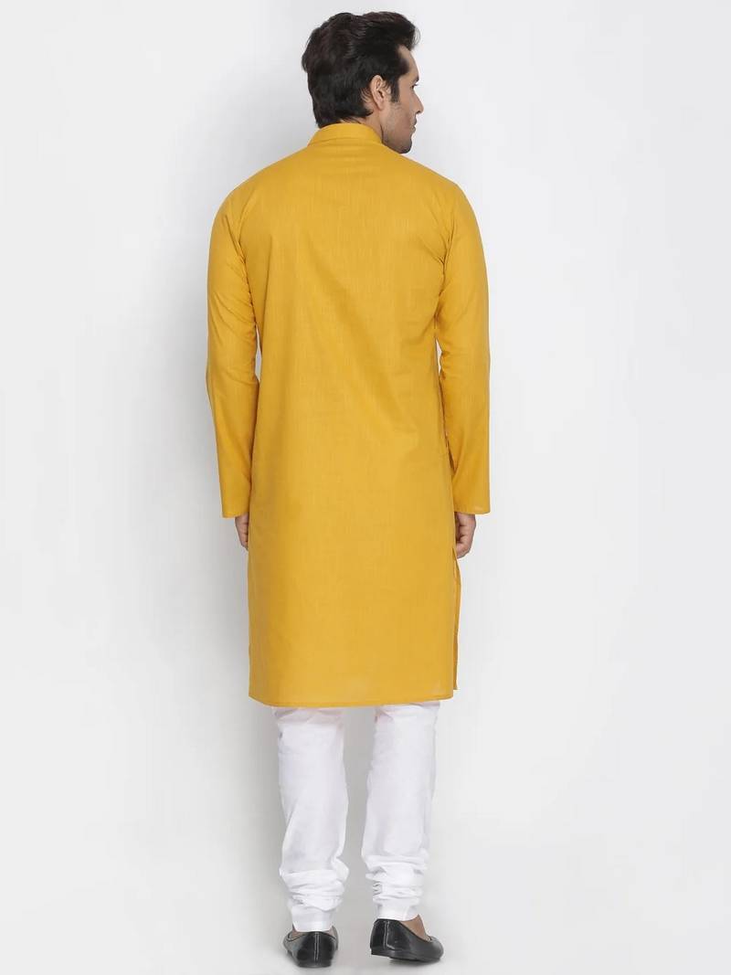 yellow cotton men's kurta with white churidar pajama