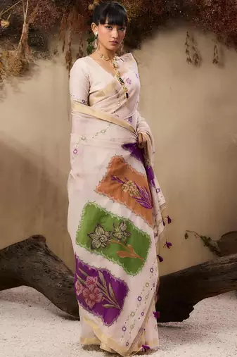 off white floral embroidered muga cotton saree with unstitched blouse