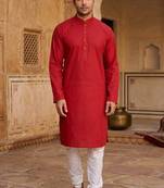 red cotton men's kurta with white churidar pajama