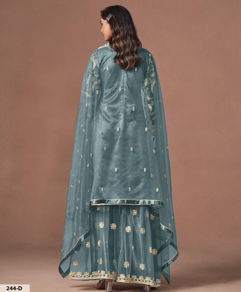 Blue net semi stitched suit with embroidery work