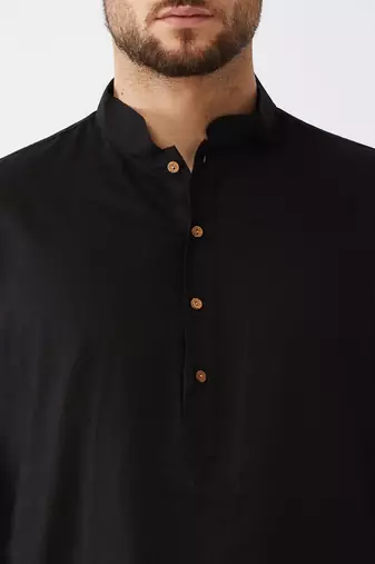 black cotton men's kurta with white churidar pajama