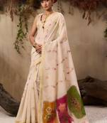 cream floral embroidered muga cotton saree with unstitched blouse