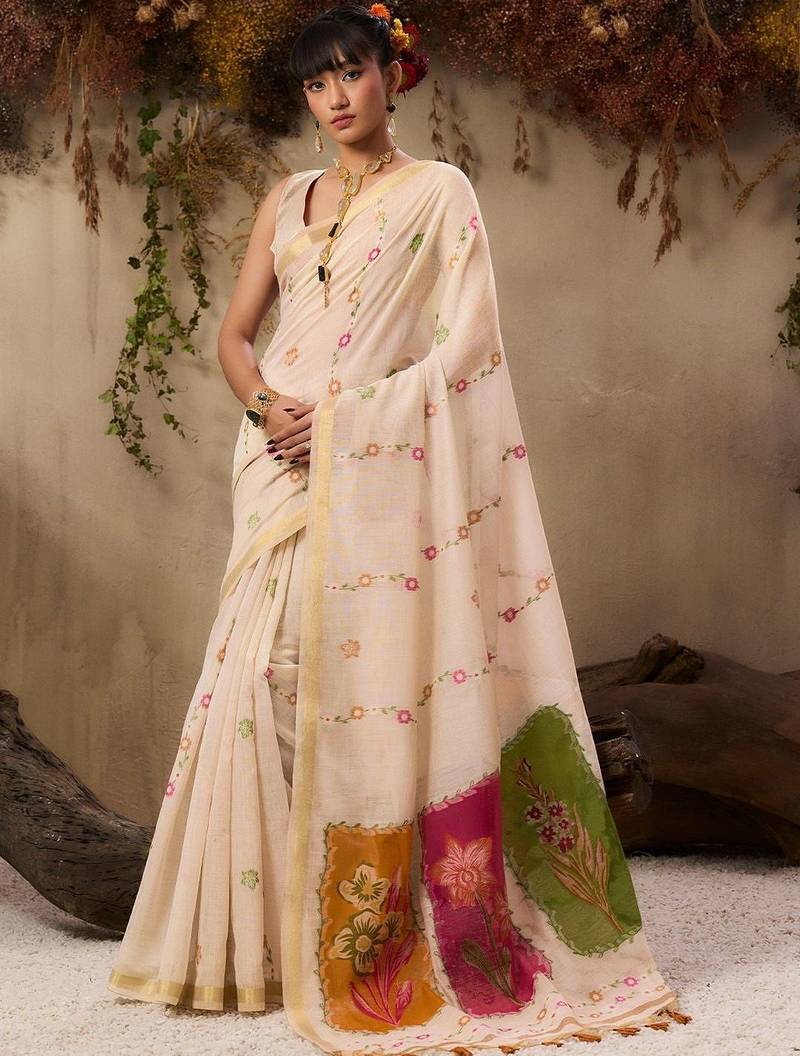 cream floral embroidered muga cotton saree with unstitched blouse