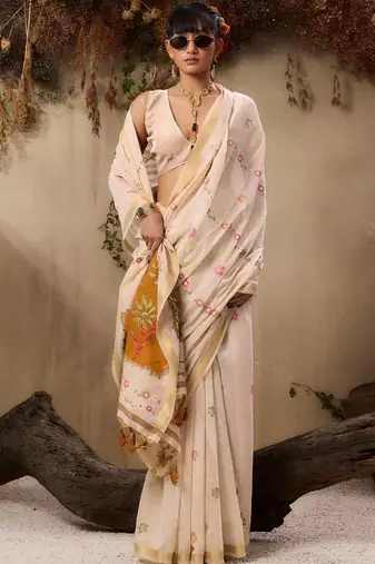 cream floral embroidered muga cotton saree with unstitched blouse