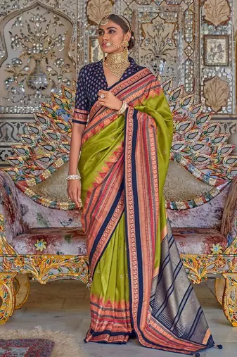Green ethnic motifs printed zari sungudi saree