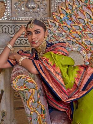 Green ethnic motifs printed zari sungudi saree 4