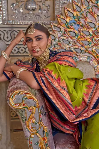 Green ethnic motifs printed zari sungudi saree