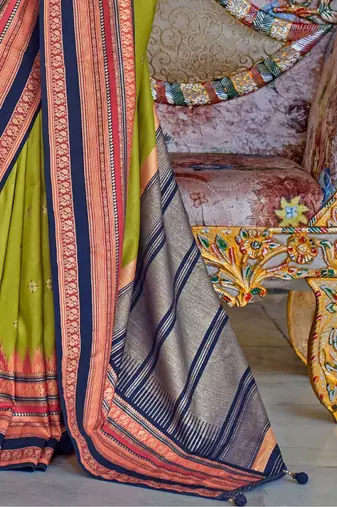 Green ethnic motifs printed zari sungudi saree