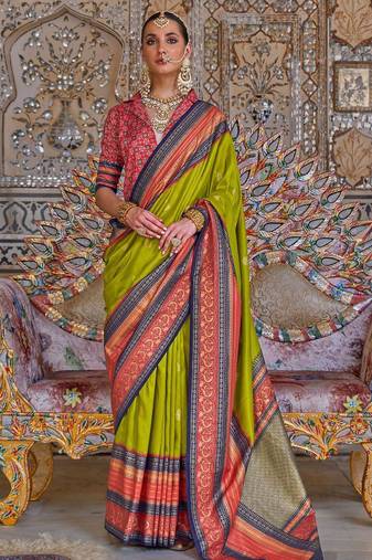 Green ethnic motifs zari sungudi saree