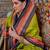 Green ethnic motifs zari sungudi saree
