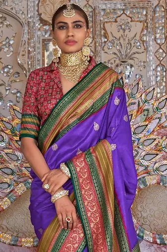Violet ethnic motifs printed zari sungudi saree