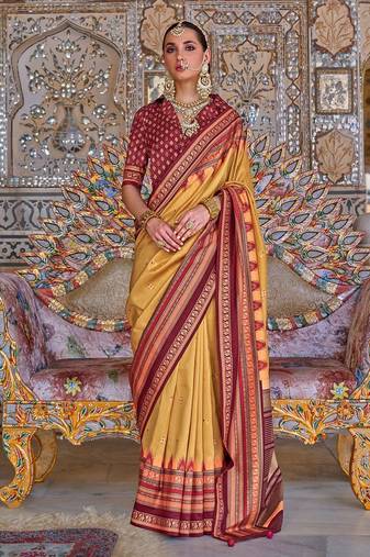 Yellow ethnic motifs designer sungudi saree