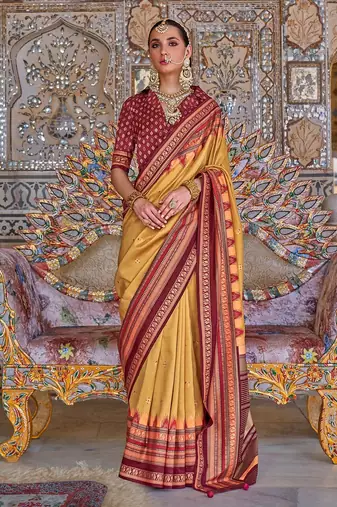 Yellow ethnic motifs designer sungudi saree