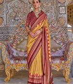 Yellow ethnic motifs designer sungudi saree