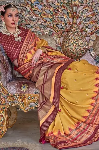 Yellow ethnic motifs designer sungudi saree