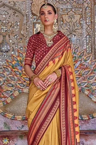 Yellow ethnic motifs designer sungudi saree