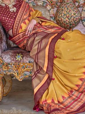 Yellow ethnic motifs designer sungudi saree 5