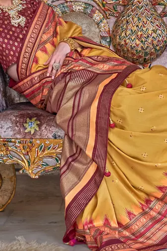 Yellow ethnic motifs designer sungudi saree
