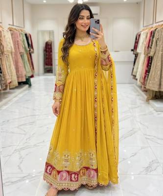 Yellow georgette embroidered flared gown set 1