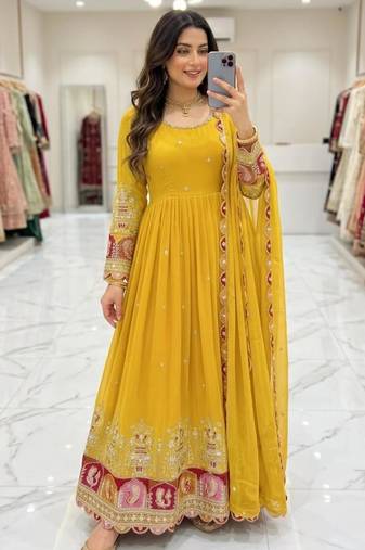 Yellow georgette embroidered flared gown set
