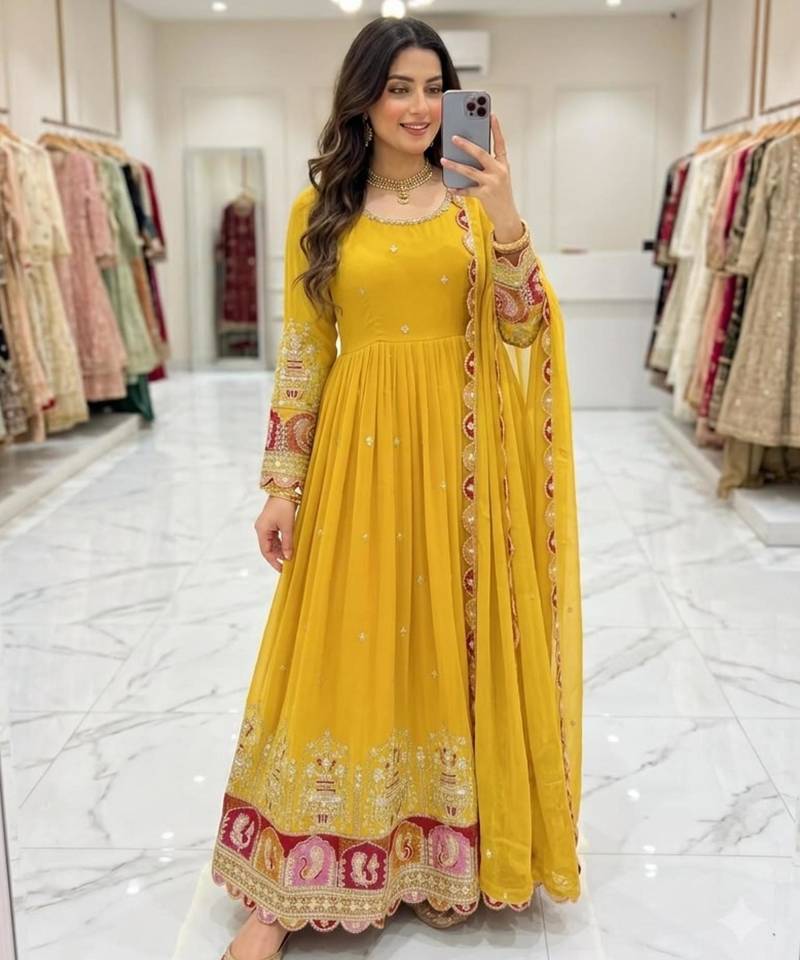Yellow georgette embroidered flared gown set