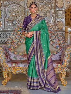 Teal ethnic motifs printed zari sungudi saree 1