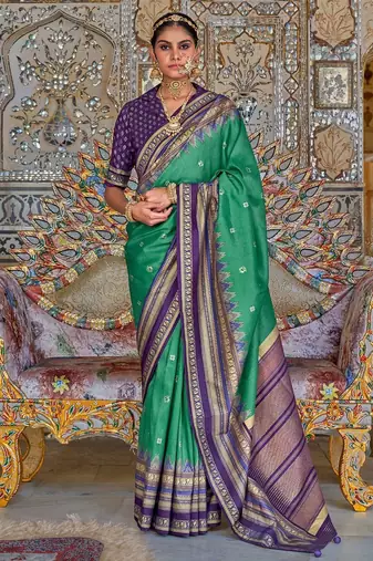 Teal ethnic motifs printed zari sungudi saree