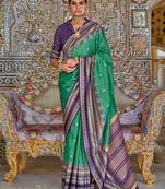 Teal ethnic motifs printed zari sungudi saree