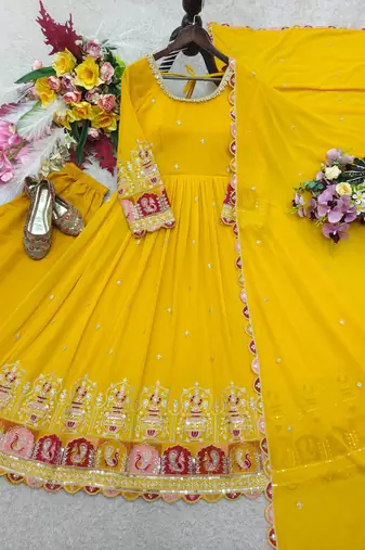 Yellow georgette embroidered flared gown set