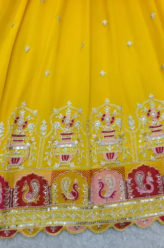 Yellow georgette embroidered flared gown set