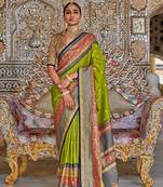 Green ethnic motifs woven design designer sungudi saree