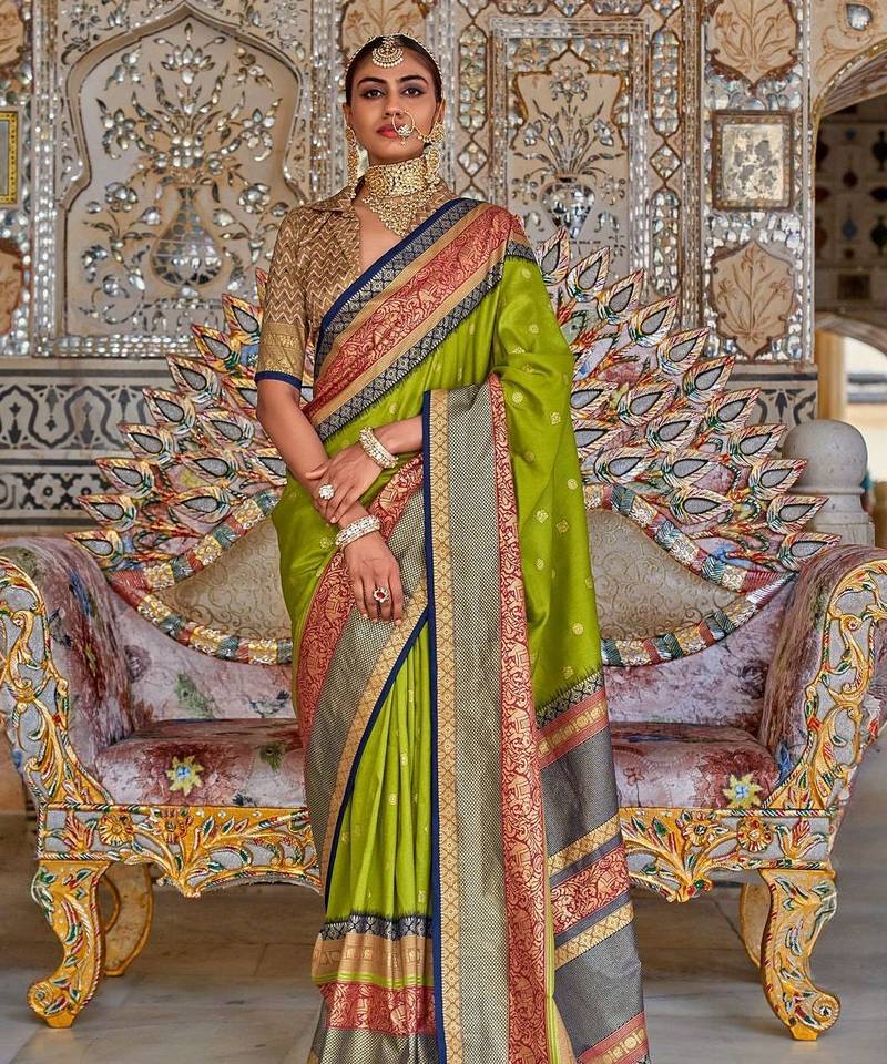 Green ethnic motifs woven design designer sungudi saree