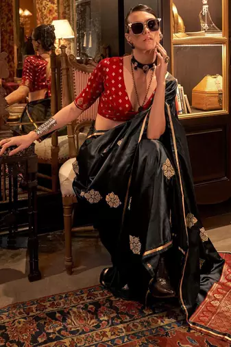 black bagh ethnic motifs woven design zari satin banarasi saree