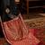 black bagh ethnic motifs woven design zari satin banarasi saree